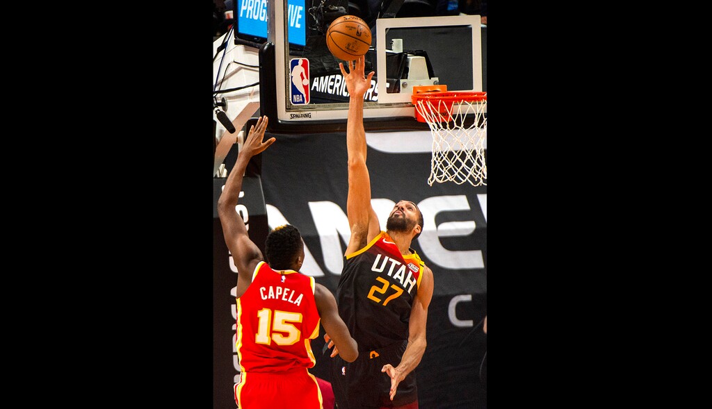(Rick Egan | The Salt Lake Tribune) Utah Jazz center Rudy Gobert (27) is called for goal tending, as he blocks a shot by Atlanta Hawks center Clint Capela (15), in NBA action between the Utah Jazz and the Atlanta Hawks at Vivint Arena, on Friday, Jan. 15, 2021.  