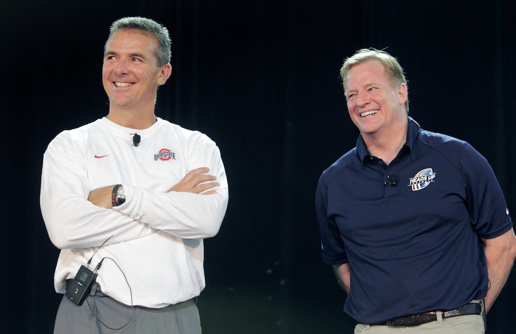 (AP Photo/Jay LaPrete, File) | NFL Commissioner Roger Goodell, right, and Ohio State NCAA college football head coach Urban Meyer answer questions during a safety clinic for mothers of youth football players in Columbus, Ohio, in this Thursday, Aug. 1, 2013, file photo. Meyer officially became coach of the Jacksonville Jaguars on Thursday, his first foray into the NFL after a successful college coaching career.