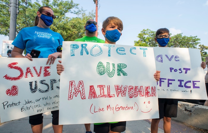 (Rick Egan  |  The Salt Lake Tribune)    Protesters gather for a rally to "Save the Post Office," hosted by Alliance for a Better Utah, NAACP Salt Lake Branch, League of Women Voters at the Post Office on 200 South in Salt Lake City, Saturday, Aug. 22, 2020.