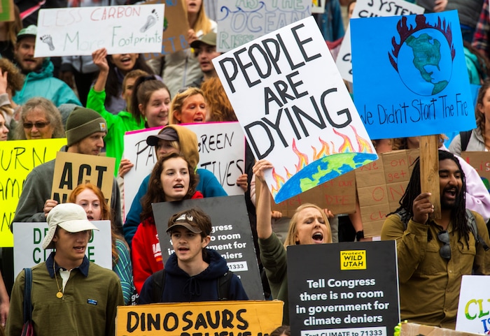 (Rick Egan  |  The Salt Lake Tribune)      Hundreds of students from around the state chant and sing as they gather on the steps of the Utah State Capitol Building, demanding action on the climate crisis. Friday, Sept. 20, 2019.