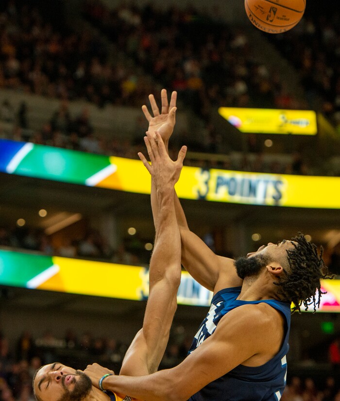 (Rick Egan  |  The Salt Lake Tribune)     Utah Jazz center Rudy Gobert gets a hand in his face as (27) Minnesota Timberwolves center Karl-Anthony Towns (32) shoots, in NBA action between the Utah Jazz and the Minnesota Timberwolves in Salt Lake City, Monday, Nov. 18, 2019.
