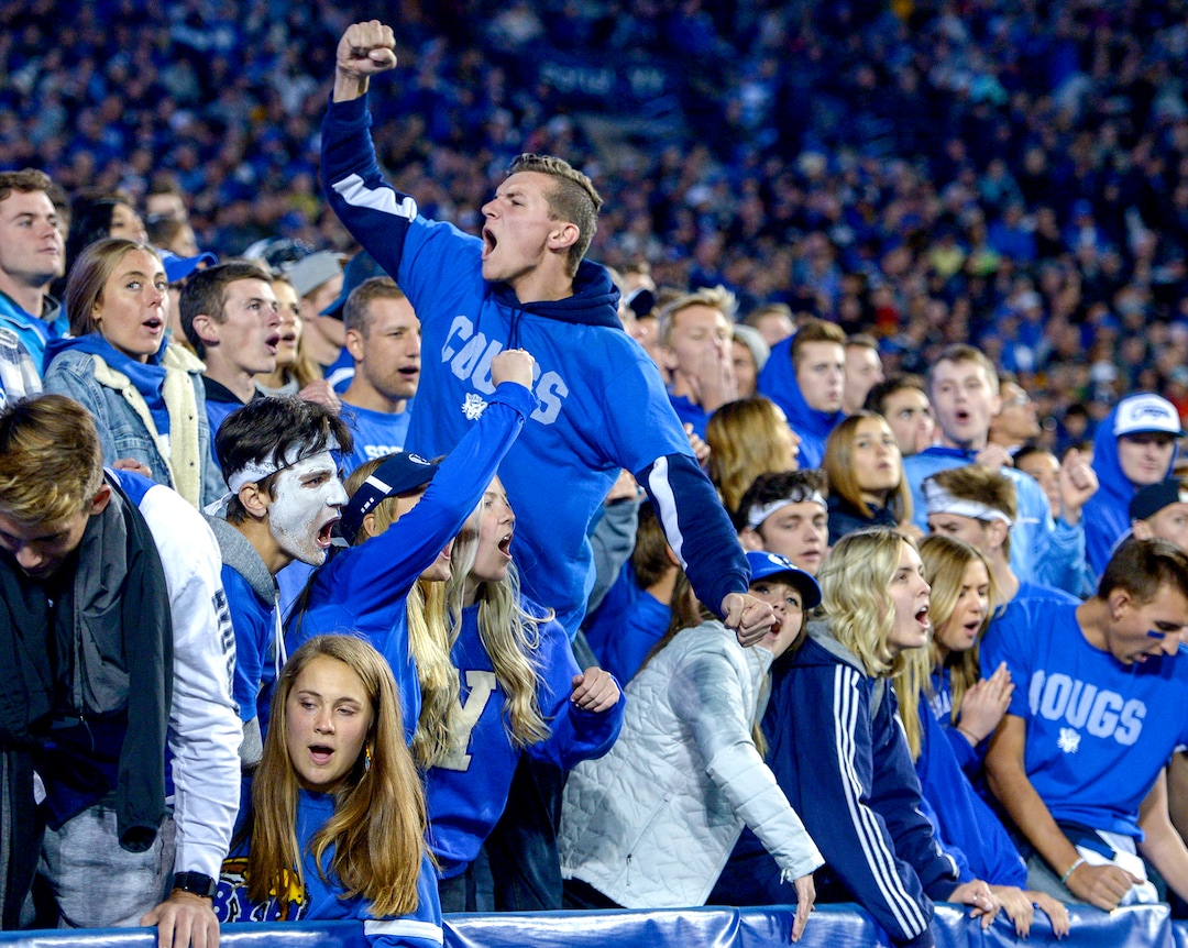 Leah Hogsten  |  The Salt Lake Tribune  BYU fans cheer as BYU hosts Utah State University at Lavell Edwards Stadium in Provo, Friday, Oct. 5, 2018.