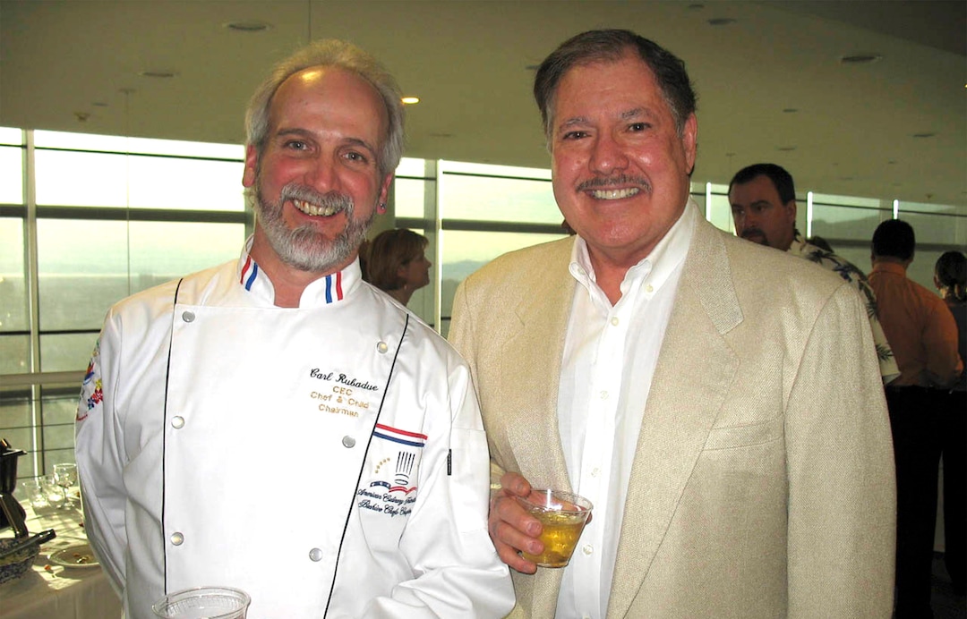 (The Salt Lake Tribune)
Chef Carl Rubadue, left, and chief master of ceremonies Tom Barberi toast the annual Chef and the Child to benefit Guadalupe Schools. Barberi died Dec. 24, 2021. He was 78.
