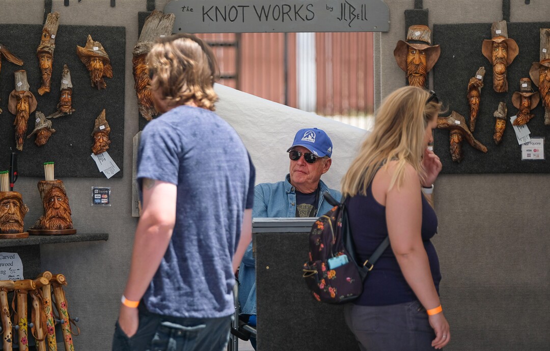 (Francisco Kjolseth  |  The Salt Lake Tribune)  James Bell, center, who brings to life tree wood knots, joins the Ogden Arts Festival which brings local and regional artists, creatives and entertainers to Ogden, UT on June 8th and 9th.
