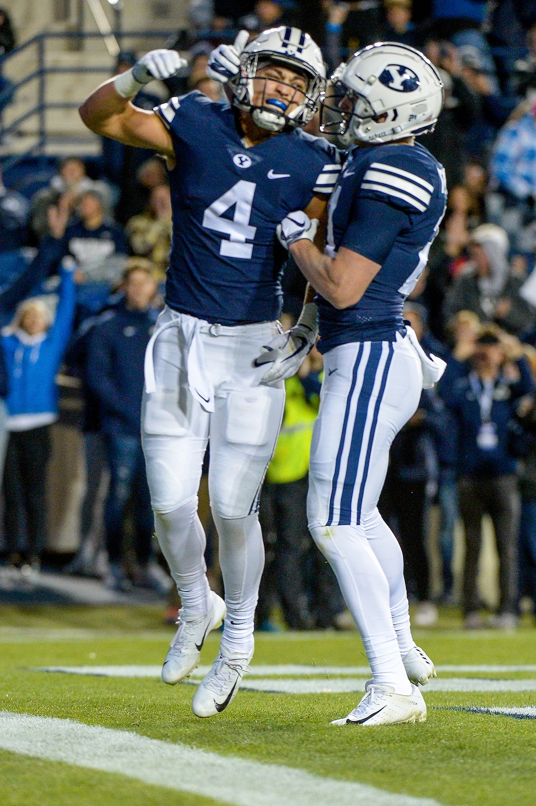 Leah Hogsten  |  The Salt Lake Tribune Brigham Young Cougars running back Lopini Katoa (4) celebrates his touchdown as Brigham Young University hosts Hawaii at Lavell Edwards Stadium in Provo, Saturday Oct. 13, 2018.
