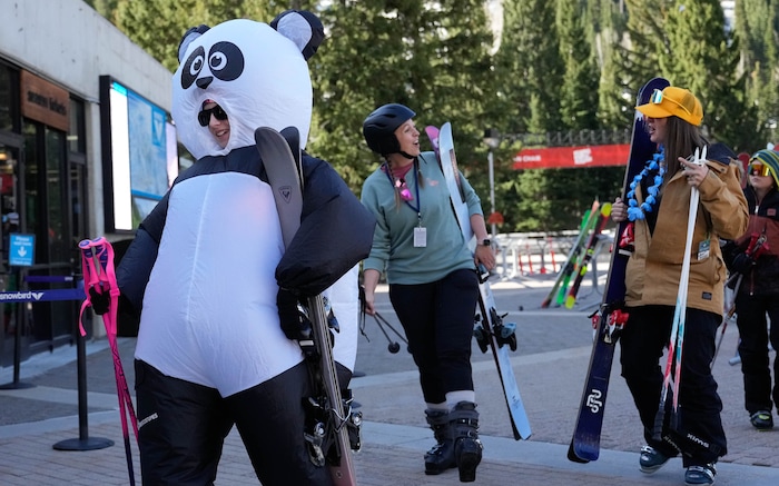 (Francisco Kjolseth  | The Salt Lake Tribune) Eva Bray goes for the panda suit as Snowbird closes the book on the 2024-25 ski season on Monday, May 26, 2025. Snow and sun revelers took to the slushy slopes on Memorial Day as the resort was the last in the state to close.