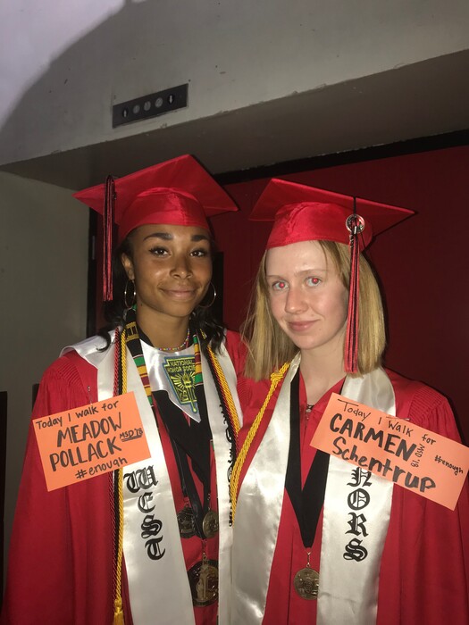 (Photo courtesy of Abena Bakenra and Liz Love)  Abena Bakenra, left, and Liz Love, right, pinned the names of students who died in a deadly Florida school shooting to their gowns when they graduated from West High School on June 6, 2018.