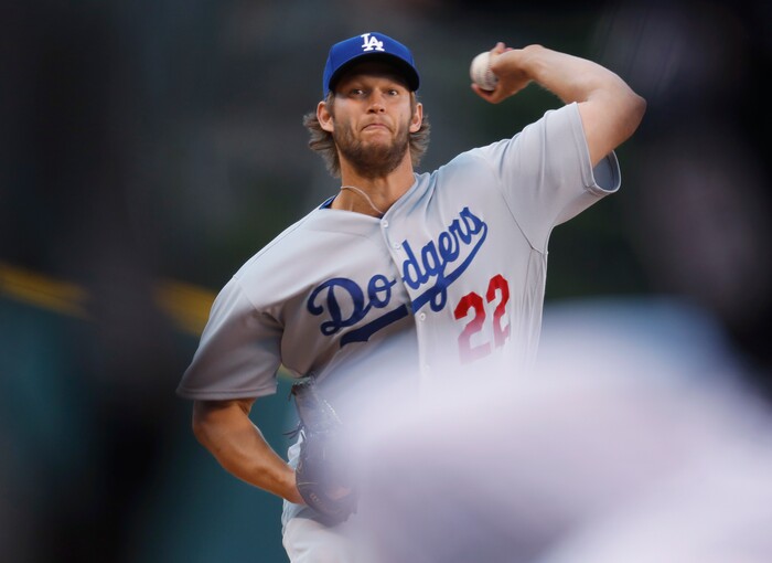 Los Angeles Dodgers starting pitcher Clayton Kershaw delivers to Colorado Rockies' DJ LeMahieu in the first inning of a baseball game Saturday, April 8, 2017, in Denver. (AP Photo/David Zalubowski)