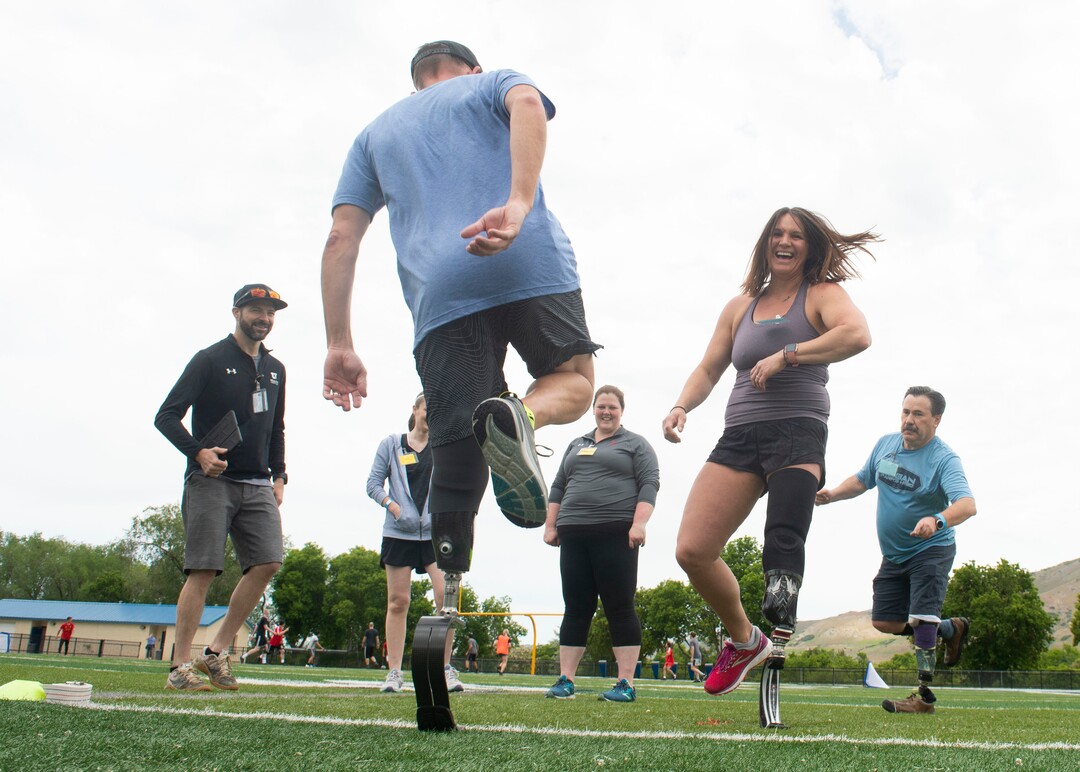 (Rick Egan  |  The Salt Lake Tribune)      participants practice bouncing up and down during the fourth annual Utah Adaptive Mobility Clinic at Skyline High school. The clinic allows anyone with "lower extremity limb loss or limb difference" or amputees without legs, to practice walking and running. Saturday, June 1, 2019.