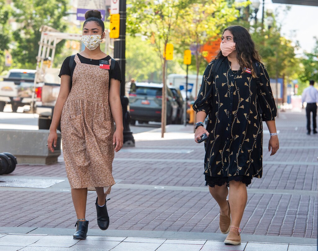 (Rick Egan  |  Tribune file photo)     Pedestrians wear masks as they walk on Main Street in Salt Lake City, on Thursday, July 9, 2020.