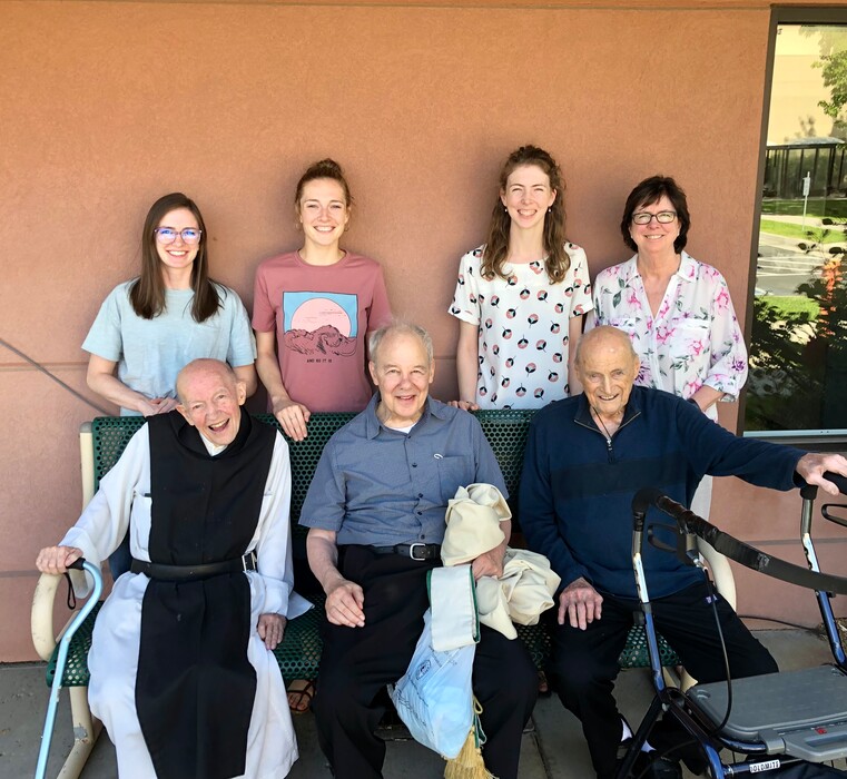 (Michael O'Brien) Back row: Michael O’Brien’s nieces and sister meet with Utah monks in 2020. Front row: Father Patrick Boyle, Father David Altman and Father Alan Hohl. Back row: Kaylin Taylor, Kater Taylor, Katie Taylor, Karen Taylor.