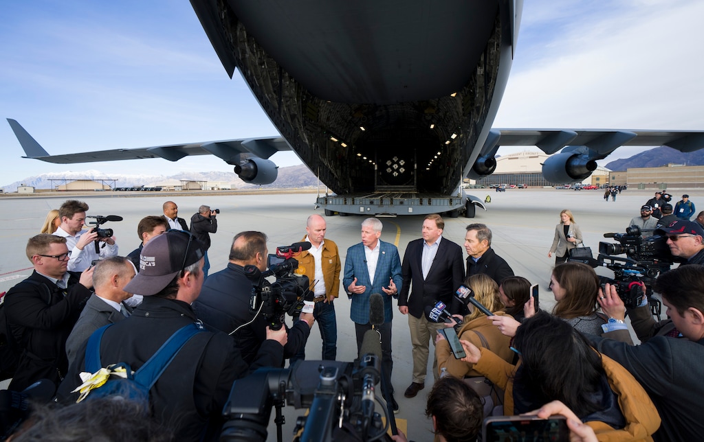 (Bethany Baker | The Salt Lake Tribune) U.S. Secretary of Energy Chris Wright, second from left, speaks alongside Gov. Spencer Cox, left, Under Secretary of Defense for Acquisition and Sustainment Michael P. Duffey, second from right, and U.S. Sen. John Curtis, right, in front of one of the three USAF C-17s that transported components of a small nuclear reactor to Hill Air Force Base near Layton, seen here on Sunday, Feb. 15, 2026.