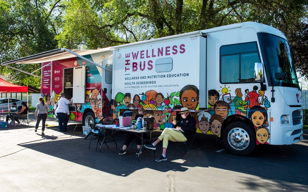 (Rick Egan  |  The Salt Lake Tribune)     A survey is given to those being tested for Covid-19 at a the Wellness Bus mobile testing site in West Valley City, on Wednesday, July 29, 2020.