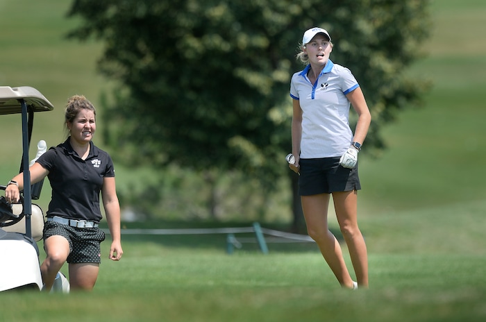 (Scott Sommerdorf   |  The Salt Lake Tribune)   Anna Kennedy (BYU) jumps to get a look at her chip shot onto the 18th green. Kelsey Chugg (Weber St.) defeated Kennedy to win the 111th Utah Womens State Amateur Championship held at Davis Park Golf Course in Fruit Heights, Friday, August 4, 2017.