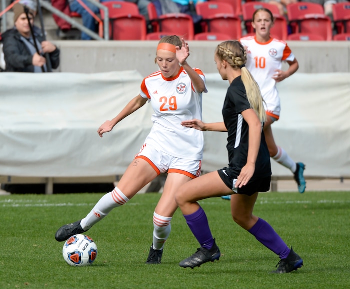 (Chris Samuels | The Salt Lake Tribune) Skyridge’s Olivia Barlow (29) handles the ball against Riverton in the 6A girls’ soccer state championships at Rio Tinto Stadium in Sandy, Friday, Oct. 22, 2021.