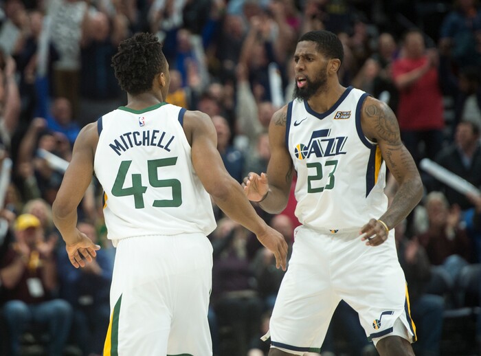 (Rick Egan  |  The Salt Lake Tribune)     Utah Jazz forward Royce O'Neale (23) congratulates Utah Jazz guard Donovan Mitchell (45) after mitchell tied up the the game 97 - 97 with a 3-point play in NBA action, Utah Jazz vs San Antonio Spurs, in Salt Lake City, Monday, February 12, 2018.