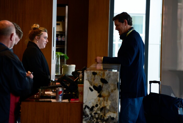 (Scott Sommerdorf | The Salt Lake Tribune)
Camille Hollingsworth helps a guest at the reception desk at the new AC Hotel in downtown Salt Lake City, Friday, April 20, 2018. Hotels and other lodging properties had 11 percent more employees last month than in the previous March, helping to lead Utah to a 3.3 percent year-over-year job growth rate, the best in the nation.