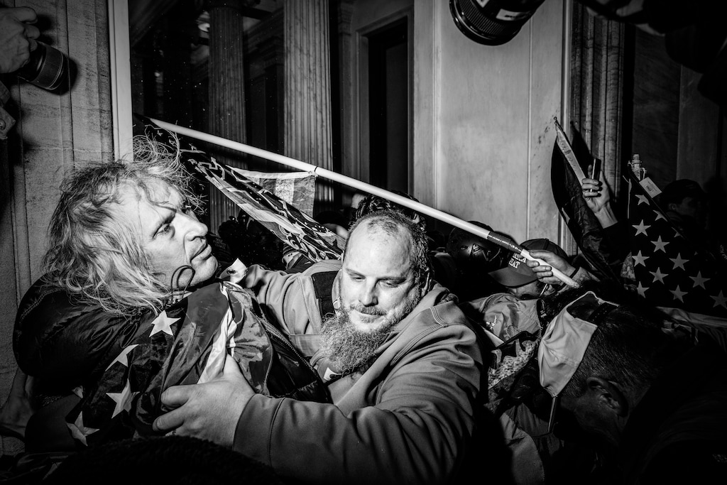 (Mark Peterson | The New York Times)
Violence inside the Capitol building as a members of a pro-Trump mob stormed the building, Jan. 6, 2021. In America, the rightÕs enemies tend to be either wild exaggerations or outright fantasies Ñ antifa supersoldiers, totalitarian globalists, satanic pedophiles, Michelle Goldberg writes.