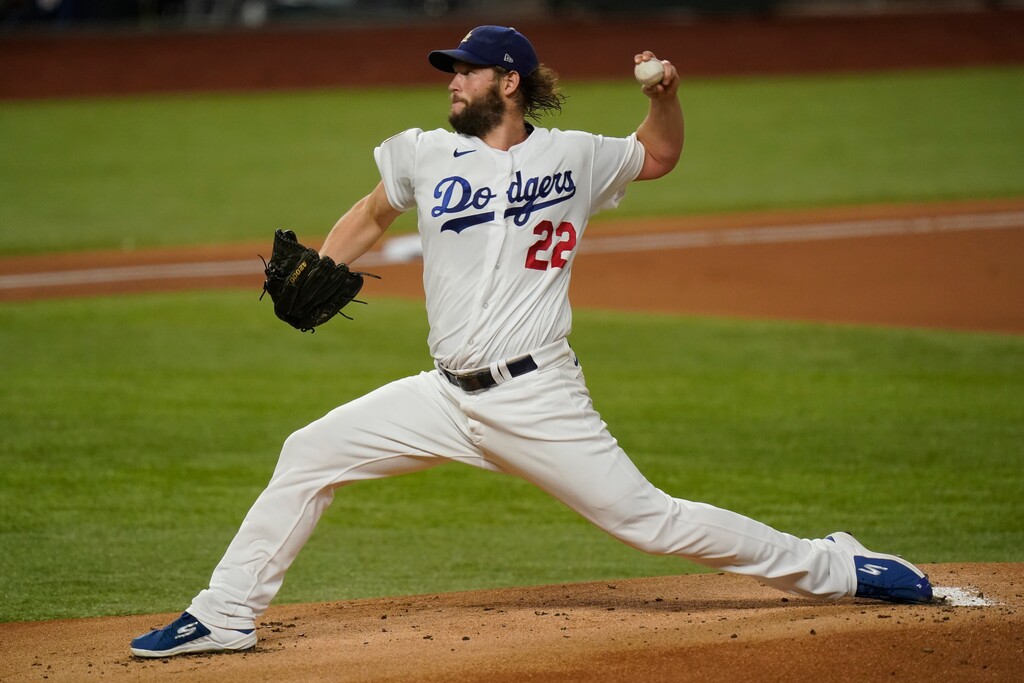 Los Angeles Dodgers starting pitcher Clayton Kershaw throws against the Tampa Bay Rays during the first inning in Game 1 of the baseball World Series Tuesday, Oct. 20, 2020, in Arlington, Texas. (AP Photo/Eric Gay)