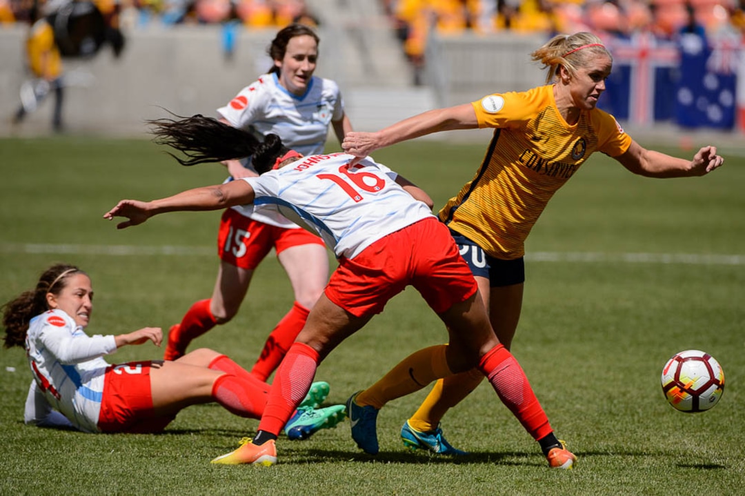 (Trent Nelson | The Salt Lake Tribune)  Utah Royals FC hosts the Chicago Red Stars, at Rio Tinto Stadium in Sandy, Saturday April 14, 2018. Utah Royals FC forward Elise Thorsnes (20) dribbles past Chicago Red Stars defender Samantha Johnson (16).