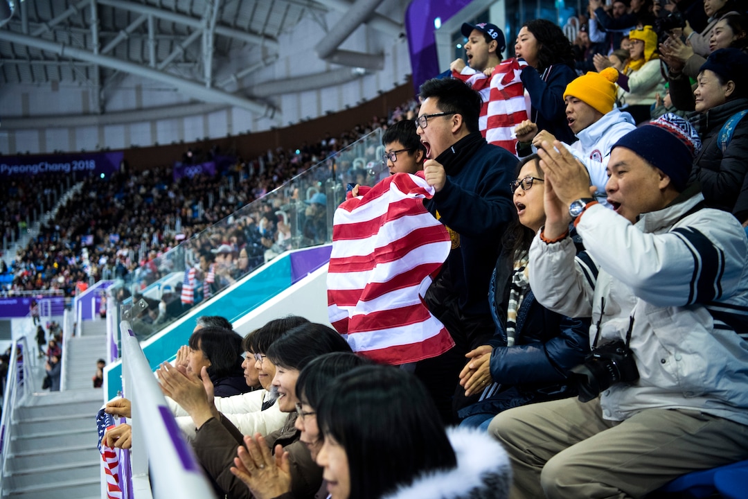 (Chris Detrick  |  The Salt Lake Tribune)  Members of Nathan Chen's family cheer as he is introduced in the Men Single Skating Free Skating at Gangneung Ice Arena during the Pyeongchang 2018 Winter Olympics Saturday, Feb. 17, 2018. Chen landed a record six quadruple jumps, scoring 215.08.