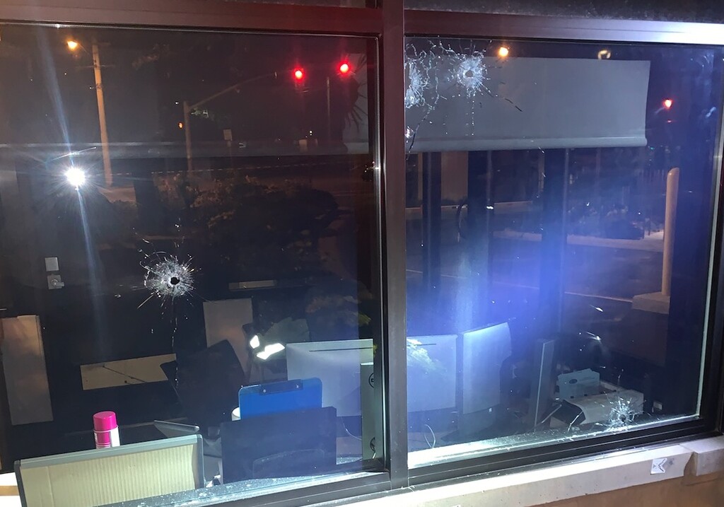 (Photo courtesy of the Provo Police Department) A drive-by shooting left bullet holes in the main security booth at the Missionary Training Center in Provo.
