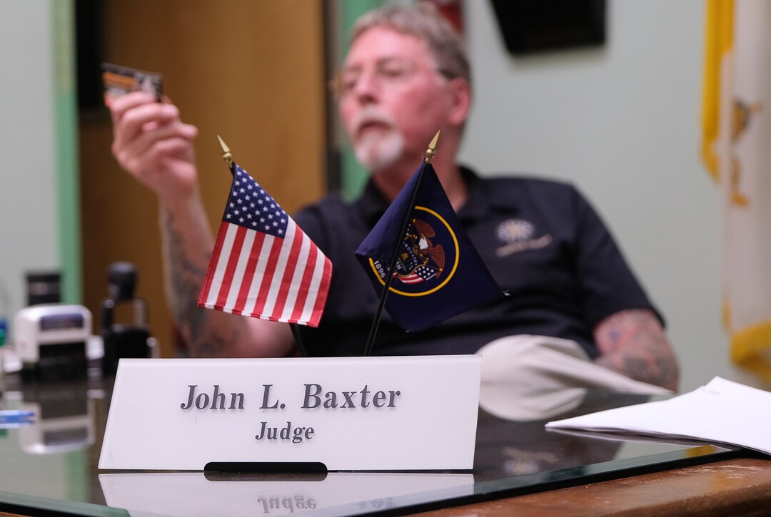 (Francisco Kjolseth  |  The Salt Lake Tribune)  Judge John L. Baxter gets ready to hold court for homeless or transient people in the Weigand Center in Salt Lake City, June 28, 2019. Since May 2004, Salt Lake City has operated a homeless court, where transients can handle misdemeanor charges without showing up in regular court. This helps the homeless person by clearing outstanding warrants they have in a less intimidating environment and it also benefits the regular court by reducing its backlog of such cases. It's part of a larger effort on the part of the American Bar Association to decriminalize homelessness.