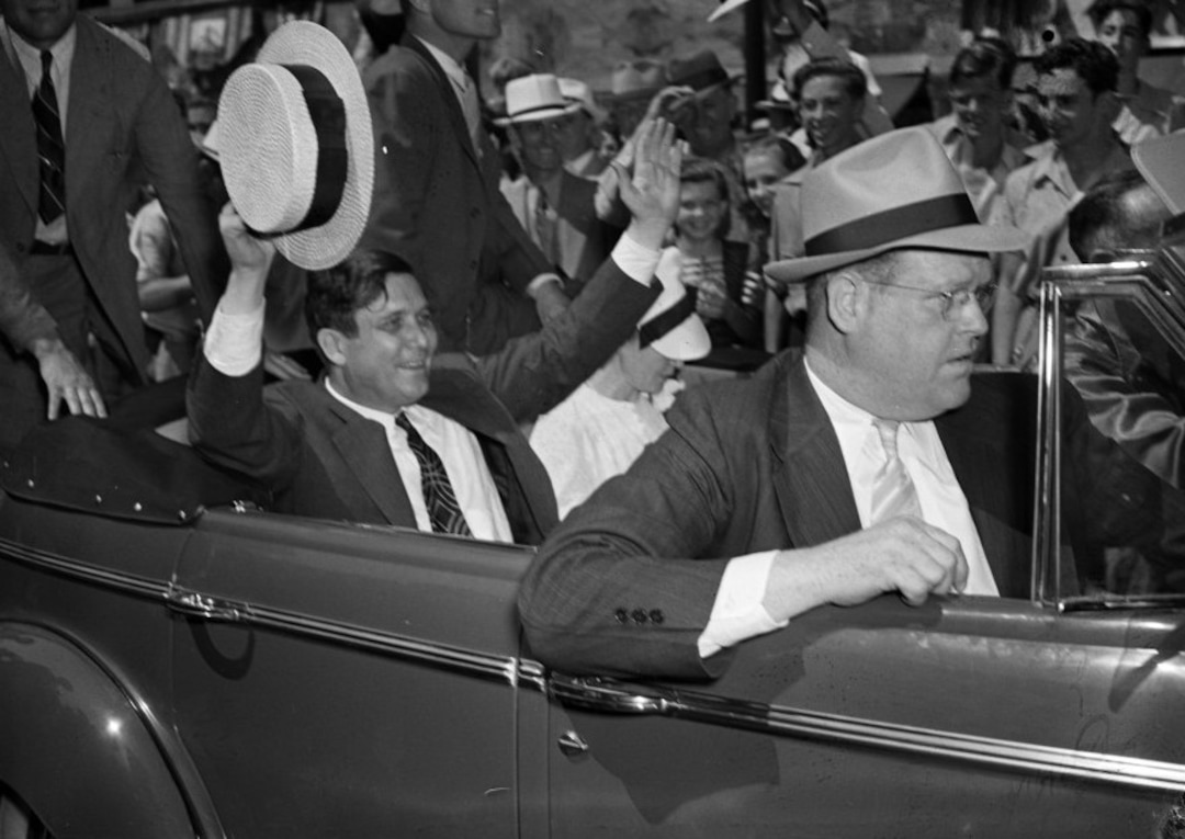 (Photo courtesy of Utah State History) Wendell Willkie, at left — an attorney and then the Republican nominee for president — waves to well-wishers while visiting Salt Lake City for the 1940 Pioneer Day parade on Main Street. It was one of the biggest editions of the annual parade before World War II.