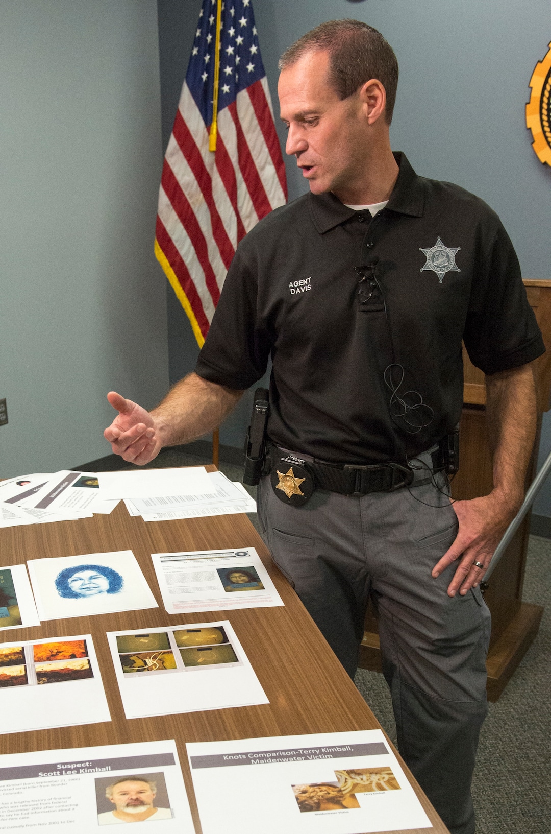 (Rick Egan  |  The Salt Lake Tribune)   Agent Brian Davis, from the Department of Public Safety, displays photos of the victim, as he asks for the public’s help identifying a murder victim in a cold case homicide from April 1998, during a news conference, Tuesday, Oct. 2, 2018.