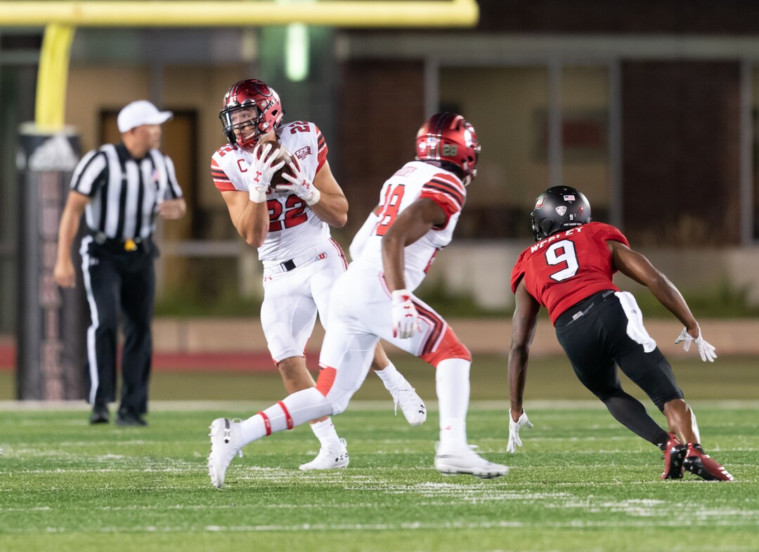 Utah Utes linebacker Chase Hansen (22) intercepts a pass by NIU Huskies quarterback Marcus Childers (not pictured) and returns it back for a touchdown late in the fourth quarter of play at Huskie Stadium in DeKalb, IL on Saturday, Sept. 08, 2018 (Sean King | for The Salt Lake Tribune)