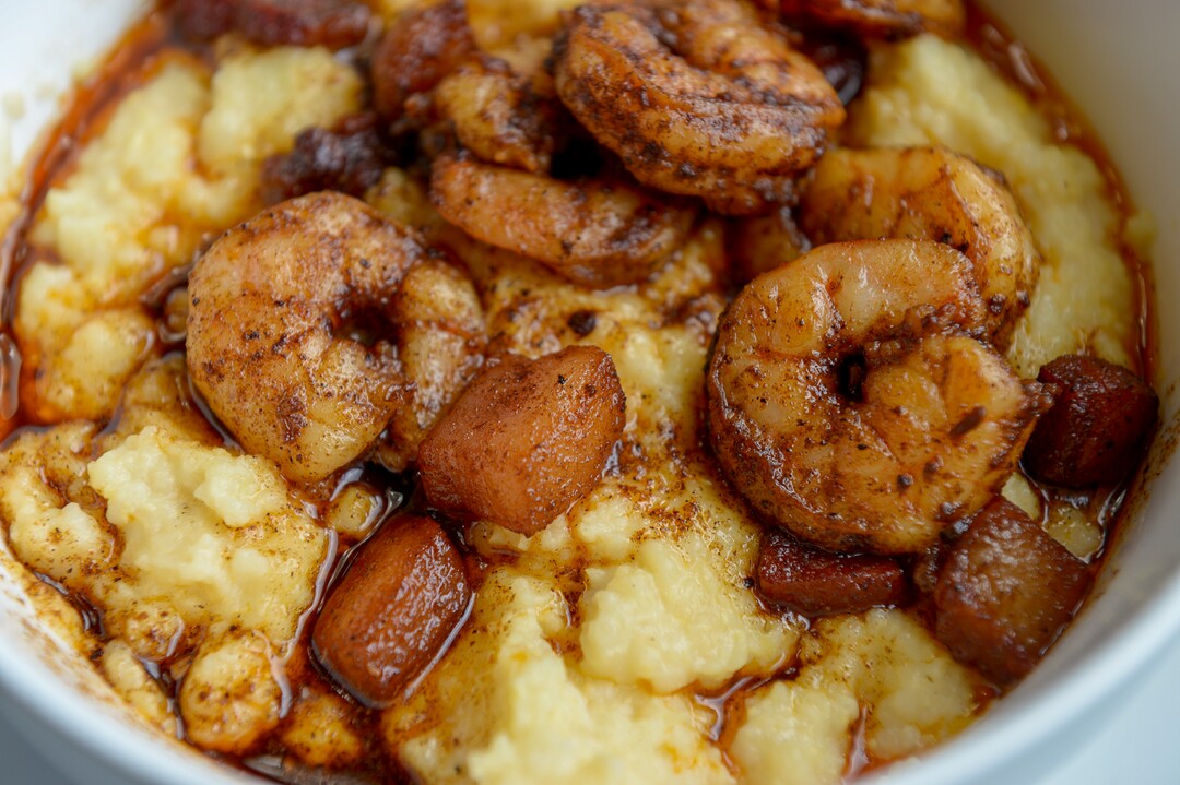 (Leah Hogsten  |  The Salt Lake Tribune) Sauce Boss Southern Kitchen's shrimp and grits with chunks of shrimp and bacon sauteed in blackened butter served over cheesy grits, $13.25 Chef Julius Thompson is expressing his love for his Southern roots at his restaurant, Sauce Boss Southern Kitchen, Sept. 10, 2019.