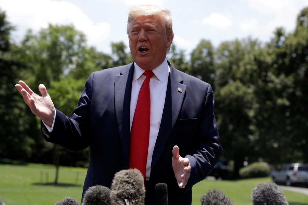 (Evan Vucci | AP Photo) In this June 26, 2019, photo, President Donald Trump speaks to reporters on the South Lawn of the White House in Washington. Trump is receiving mixed reviews for his stewardship of the U.S. economy, even as Americans feel increasingly good about how things are going. That’s according to a new survey by The Associated Press-NORC Center for Public Affairs Research.