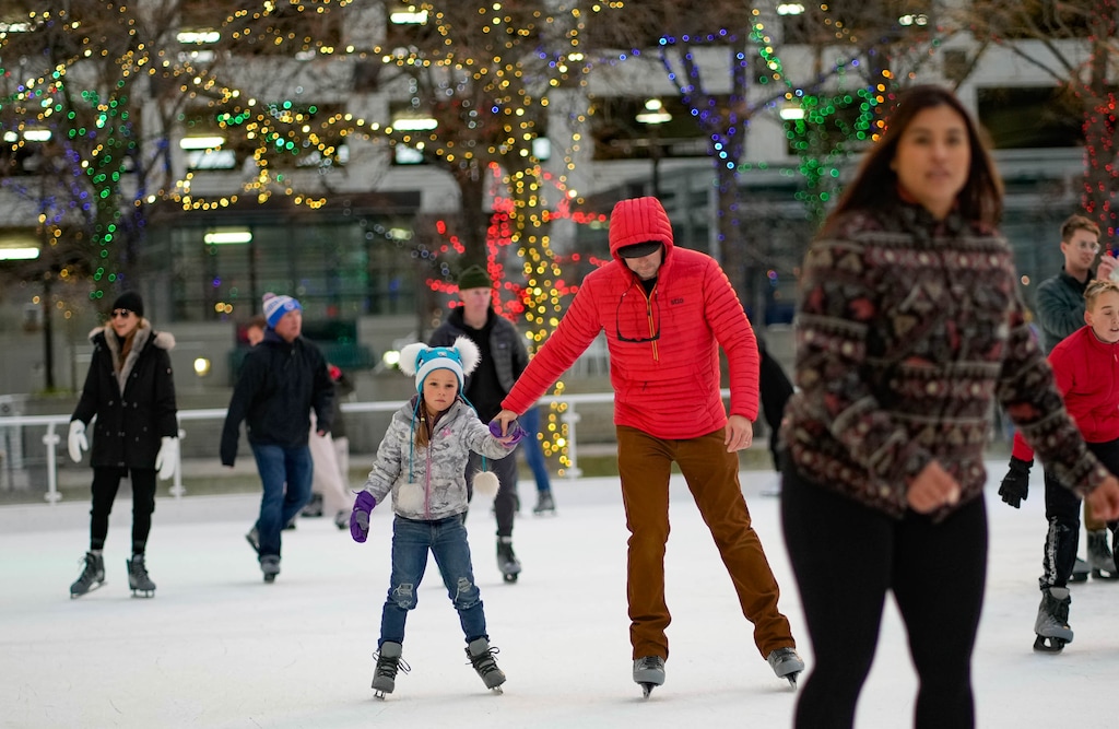 (Francisco Kjolseth  |  The Salt Lake Tribune) The ice rink at Gallivan Center draws in skaters of all ages as people take in the lights in downtown Salt Lake City on Saturday, Nov. 25, 2023.