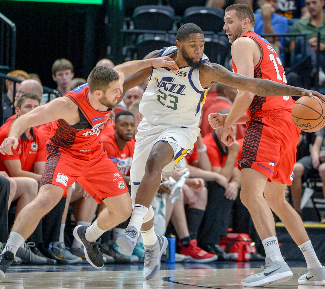 Leah Hogsten  |  The Salt Lake Tribune  Utah Jazz forward Royce O'Neale (23) steals from Perth Wildcats guard Mitch Norton (8) in the first half as the Utah Jazz host the Perth Wildcats during their preseason game, Sept. 29, 2018 at Vivint Smart Home Arena.