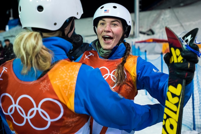 (Chris Detrick  |  The Salt Lake Tribune)  USA's Kiley McKinnon, left, and USA's Madison Olsen hug after learning they both qualified for the finals during the Ladies' Aerials Qualification at Phoenix Park during the Pyeongchang 2018 Winter Olympics Thursday, Feb. 15, 2018.  