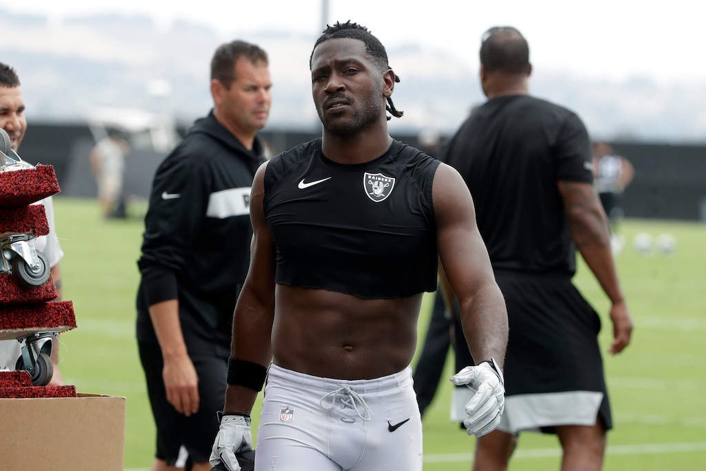 (Jeff Chiu, AP file photo) Oakland Raiders' Antonio Brown walks off the field after NFL football practice in Alameda, Calif., Aug. 20, 2019. Coach Jon Gruden says star receiver Antonio Brown is back with the team and is expected to play the season opener on Monday, after a run-in with general manager Mike Mayock put him in jeopardy of being suspended.