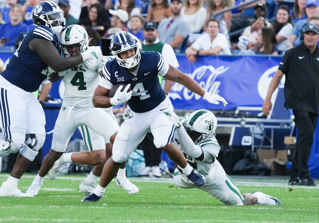 (Bethany Baker | The Salt Lake Tribune) Portland State Vikings safety Jerome Roberts (26) tackles Brigham Young Cougars running back LJ Martin (4) during the game between the Brigham Young Cougars and the Portland State Vikings in Provo on Saturday, Aug. 30, 2025.
