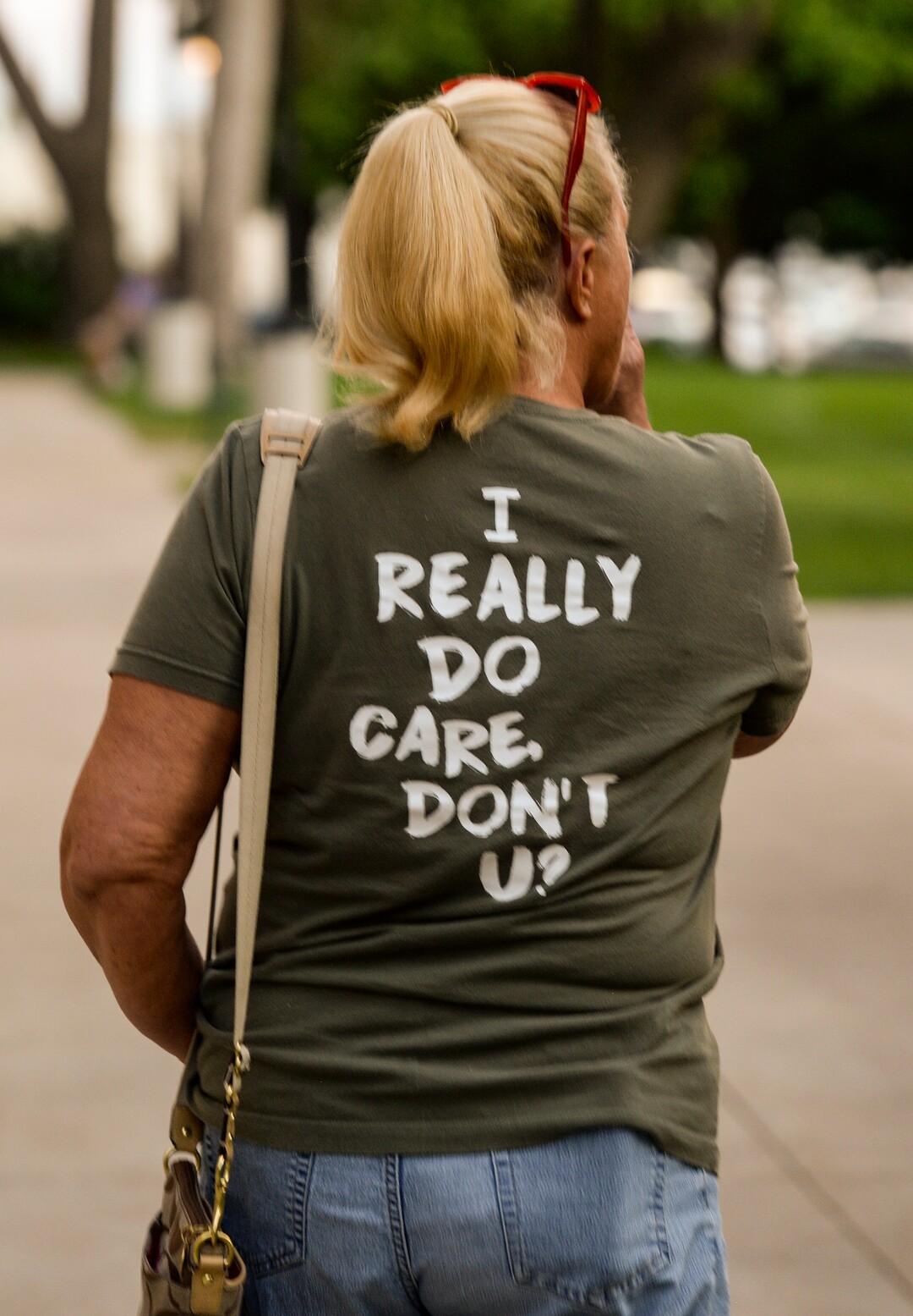 (Leah Hogsten  |  The Salt Lake Tribune) Diahann Jensen arrives early for the Lights for Liberty: A Vigil to End Human Detention Camps at Washington Square, July 12, 2019 to protest the inhumane conditions faced by refugees.