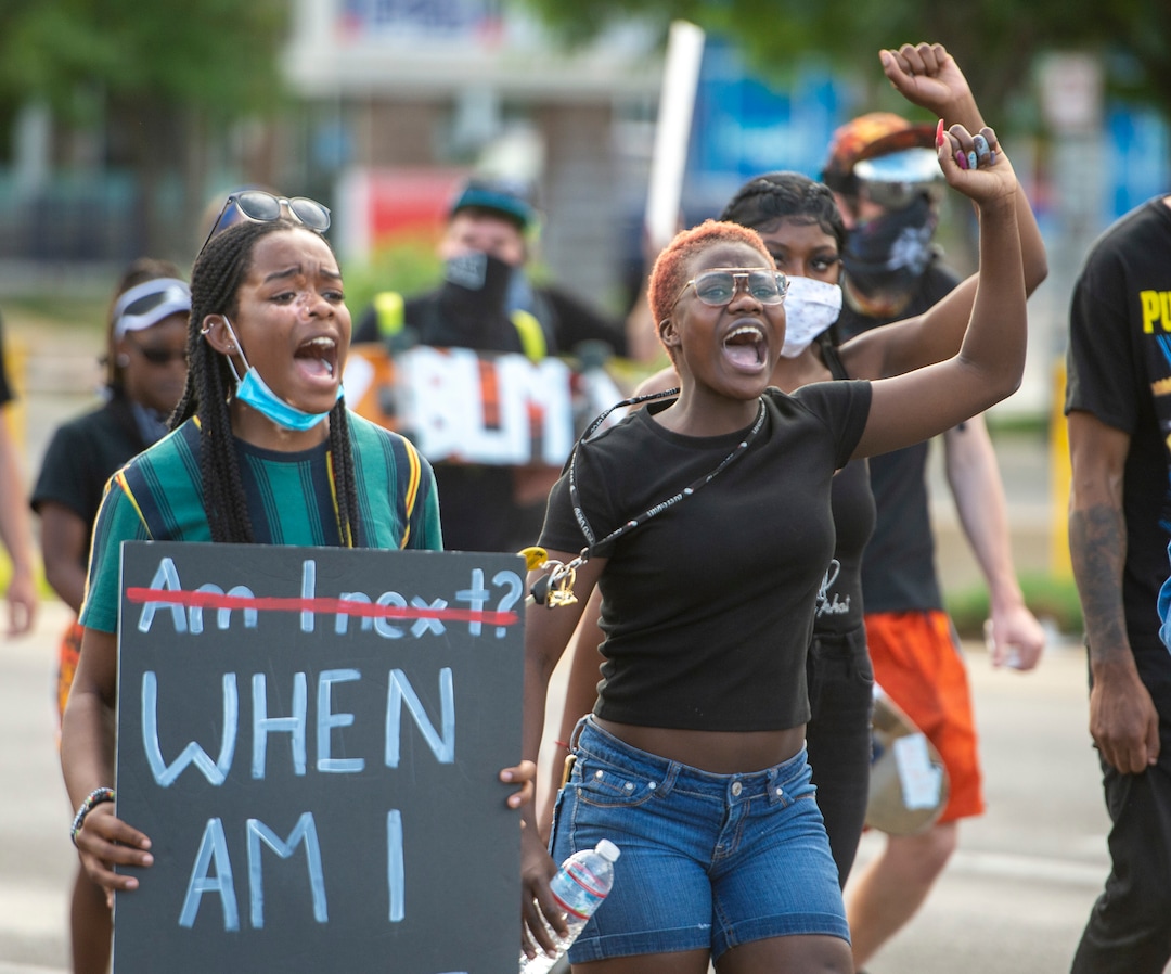 (Rick Egan  |  The Salt Lake Tribune) Protesters chant as they march up 300 South in Salt Lake City on Wednesday, June 3, 2020.