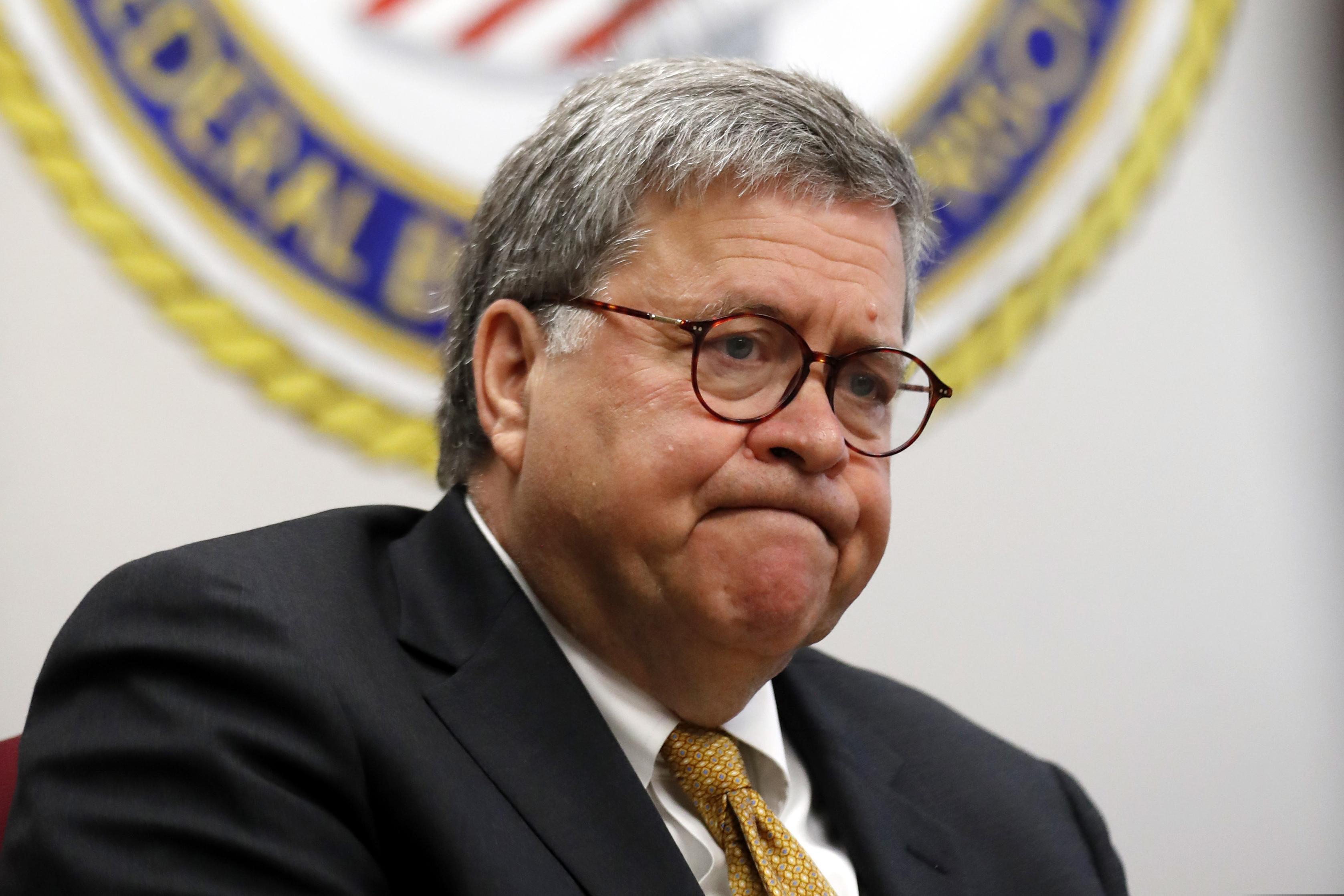 (John Bazemore | AP) In this July 8, 2019 file photo, Attorney General William Barr speaks during a tour of a federal prison in Edgefield, S.C.