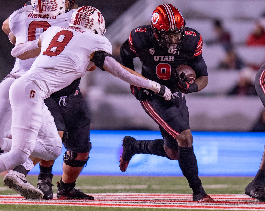 (Rick Egan | The Salt Lake Tribune) Utah running back Tavion Thomas (9) runs for the Utea, in PAC-12 football action between the Utah Utes and the Stanford Cardinalat Rice-Eccles Stadium, on Saturday, Nov. 12, 2022.