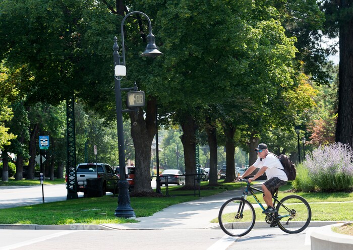 (Rick Egan  |  The Salt Lake Tribune)      Salt Lake City has installed ten traffic signal detectors, which use a radar device that is triggered by people riding bicycles, to help bicyclists cross the street when no traffic is around. Wednesday, Aug. 1, 2018.


