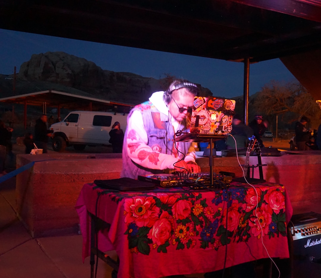 (Zak Podmore | The Salt Lake Tribune) Krieg Benally of Neon Nativez DJs at the Bluff International Balloon Festival on Saturday, Jan. 18, 2020.