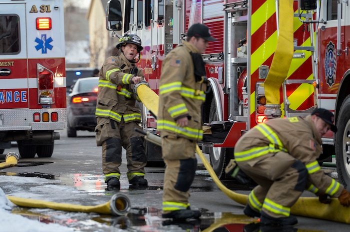 (Leah Hogsten | The Salt Lake Tribune) Weber County emergency personnel and firefighters work the scene of a small, private plane that crashed in a residential neighborhood in Roy, Jan 15, 2020. A 64-year-old pilot was killed.