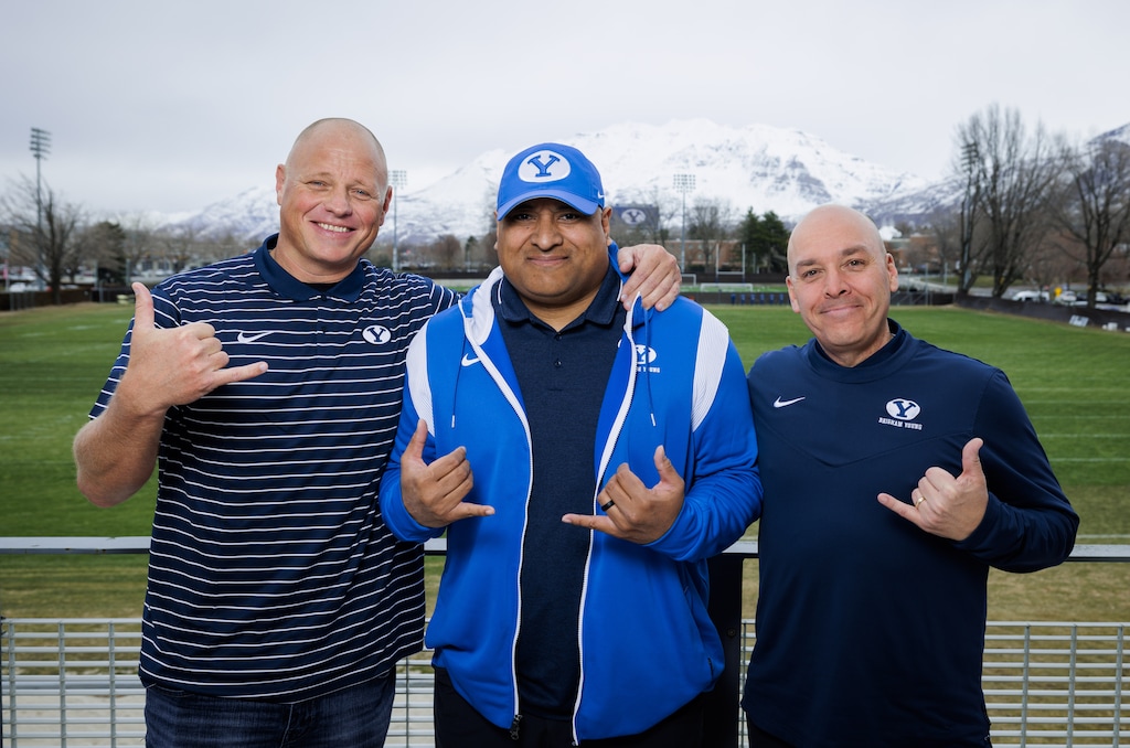 (BYU Athletics) Hans Olsen, left, poses with  BYU head coach Kalani Sitake and play-by-play man Greg Wrubell. Olsen will join the BYU football broadcast team next season.

2023 BYU Football 

Photo by Jaren Wilkey/BYU

March 29, 2023.