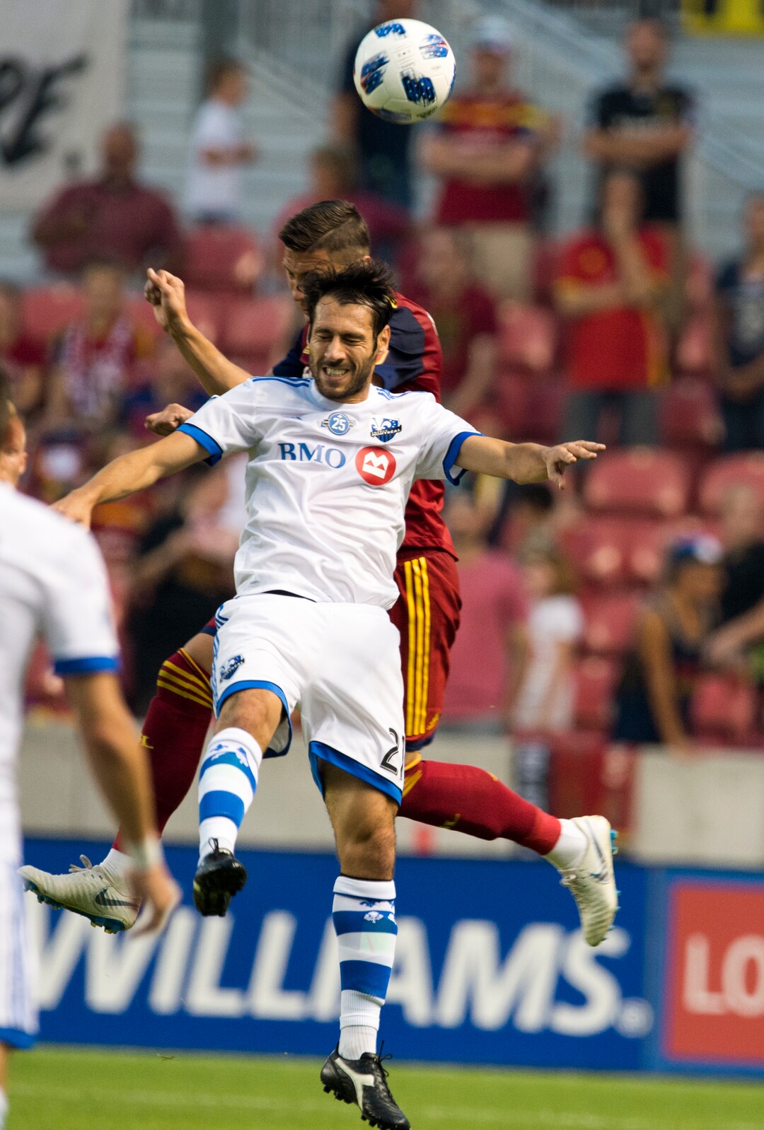 Real Salt Lake midfielder Damir Kreilach (6) goes for the ball along with Montreal Impact forward Matteo Mancosu (21) during an MLS soccer match in Sandy, Utah, Saturday, Aug. 11, 2018. (Rick Egan/The Salt Lake Tribune via AP)