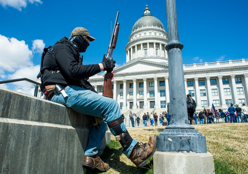 (Rick Egan | The Salt Lake Tribune) A man brings firearms to a rally at the Capitol in 2021. A fatal shooting at Salt Lake City’s "No Kings" rally on Saturday, June 14, 2025, raises questions about Utah’s gun laws, self-defense and civil liability.