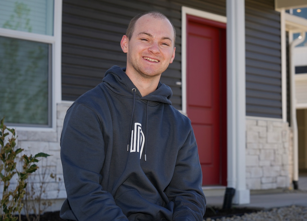 (Bethany Baker  |  The Salt Lake Tribune) Jared Bowen, a first time homeowner who used NestSTEPS to accelerate his savings, sits in front of his new home in Saratoga Springs on Wednesday, Sept. 23, 2026.
