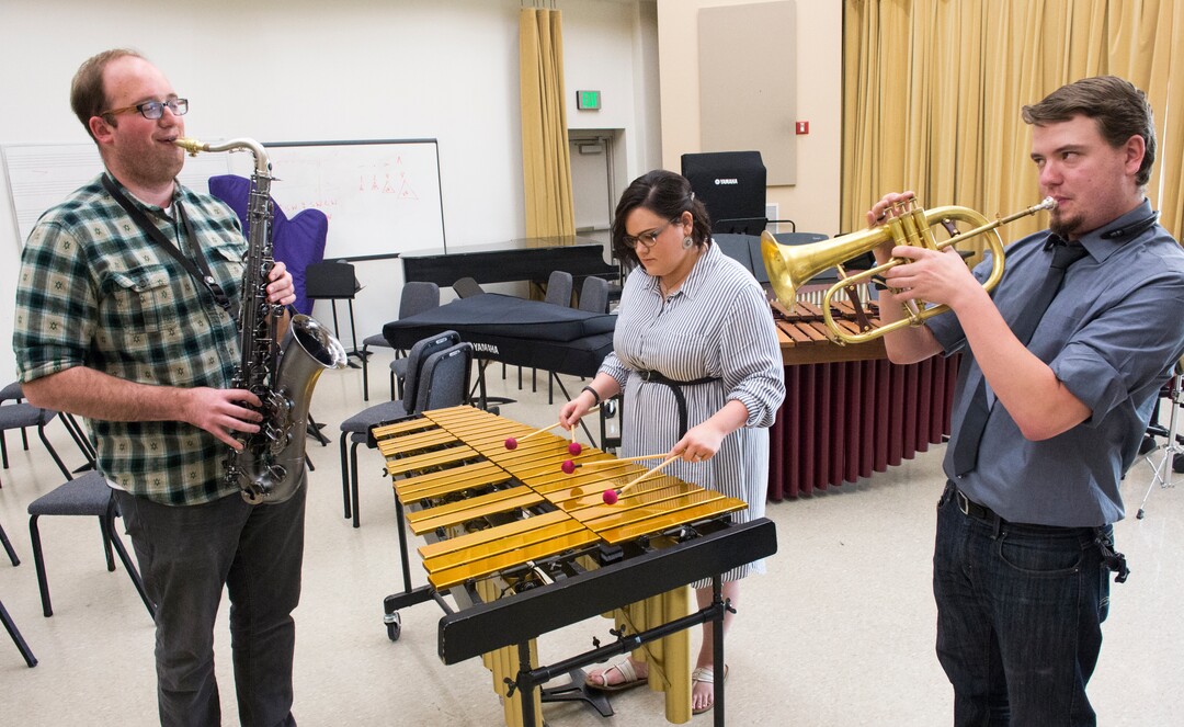(Rick Egan  |  The Salt Lake Tribune) Dixie State University students Chris Flinders, Courtney Gordon and James Hetrick practice in the music room on campus. Each of them has spoken out against the way the university handled the terminations of music professor Ken Peterson and Glenn Webb, the recently terminated music department chair.  Friday, April 6, 2018.