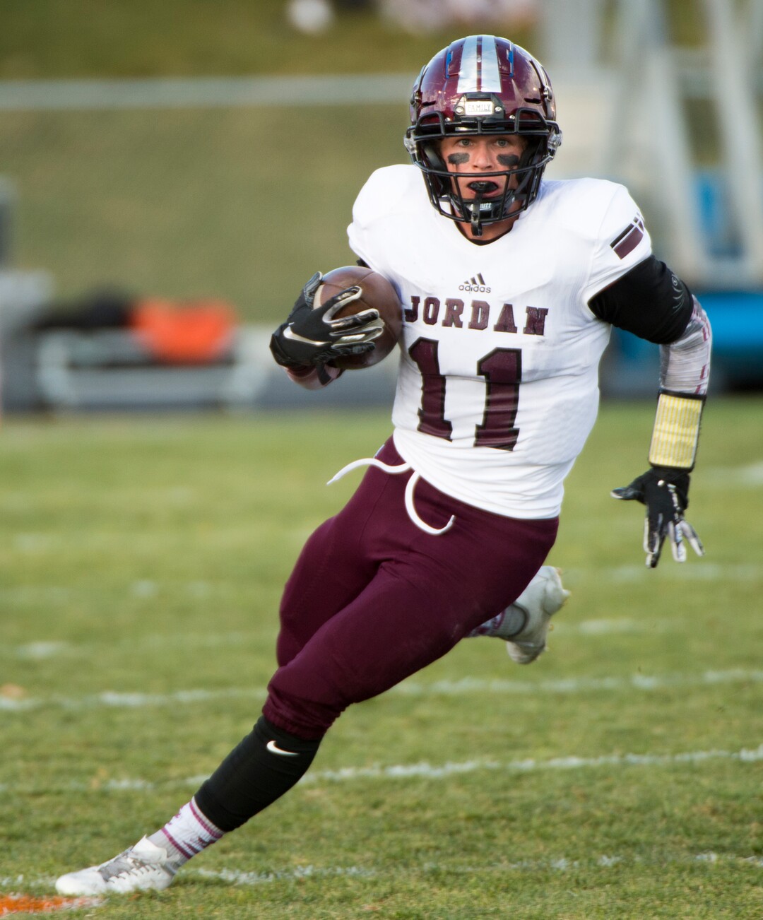 (Rick Egan  |  The Salt Lake Tribune)   Jordan running back Jake Shaver (11) runs for a huge gain, in prep 5A playoff action between Jordan High and Skyridge High, in Lehi, Friday, Nov. 2, 2018.